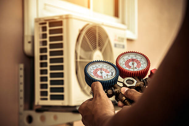 Professional Air Conditioning Service technician working in Celeste, TX